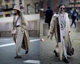 Due donne con trench eleganti. La prima con cappello a secchiello e pantaloni ampi, la seconda con blazer a quadri. Si può mettere il trench di sera per un look chic.