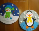 Pupazzi di neve e pinguini colorati, perfetti per le decorazioni invernali scuola primaria.