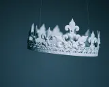Biała korona z liliami, zawieszona na nitce. Czy to symbol władzy, czy może elżbieta rakuszanka ciekawostki o królewskich ozdobach?
