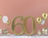 Złota liczba 60, balony i prezenty. Idealne życzenia na 60 urodziny!