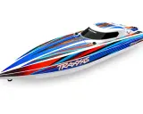 Ein schnelles RC-Boot mit dynamischem Streifenmuster in Blau, Rot und Orange. Dieses Modell ist Teil der Traxxas Bootsmodelle.