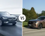 Porównanie Volvo XC90 i nowego SUV-a Mazda CX-60. Dwa luksusowe auta na drodze.