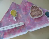 Kolorowa kartka urodzinowa DIY z namalowanym tortem i balonami. Napis "Wszystkiego Najlepszego Gaba! :D" dodaje osobistego charakteru.
