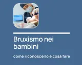 Dentista esamina un bambino, affrontando il tema del bruxismo nei bambini: come riconoscerlo e cosa fare.
