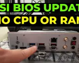 Mise à jour du BIOS MSI sans CPU ni RAM. Une main pointe le bouton "Flash BIOS" sur la carte mère.