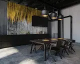 Nowoczesna kuchnia w stylu industrialnym z czarnymi meblami, złotą tapetą i betonową podłogą.