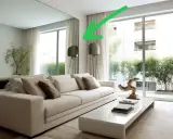 Un grand miroir reflète un salon moderne avec un canapé blanc et une table basse. Idéal pour savoir ou placer miroir salon.
