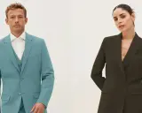 Man in teal single-breasted suit with vest, woman in dark green double-breasted blazer.