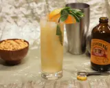 Ein erfrischendes Getränk mit Orange und Minze, dazu eine Flasche Ginger Brew und Erdnüsse. Selbst ein leidender Bastard würde hier aufleben.