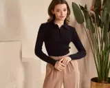 Jakie spodnie do czarnej bluzki? Przewodnik po modnych stylizacjach.
