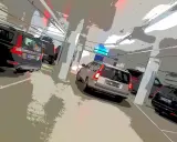 Samochody na parkingu podziemnym w Norwegii. Uważaj na mandaty, parkując nieprawidłowo.