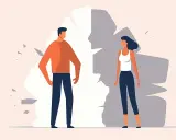 Hombre y mujer separados por una pared rota, simbolizando problemas de pareja.