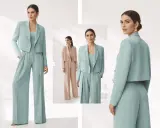 Modello indossa un completo laurea verde acqua con giacca corta e pantaloni a palazzo. Elegante e moderno.