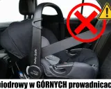 Błąd w montażu: pas biodrowy fotelika w górnych prowadnicach. Zobacz, jak zamontować otulacz do fotelika bezpiecznie.