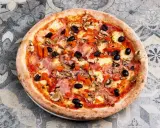 Domowa pizza jak z pizzerii? Odkryj sekrety idealnego smaku!