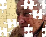 Twarz starszej osoby z Alzheimerem, jak puzzle, które powoli się rozpadają. Jak poznać, że chory na alzheimera umiera?