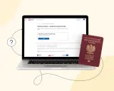 Wniosek o paszport online na gov.pl. Obok laptopa leży paszport.