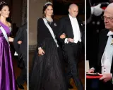Prinsessan Sofia i svart klänning och tiara, vid sidan av en man i frack. Till vänster prinsessan Victoria i lila klänning. Till höger en man med medaljer. Nobel.