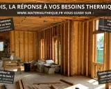 Construction d'une maison en bois, mettant en avant la **résistance thermique bois** pour un confort optimal toute l'année.