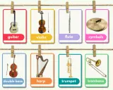 Un ensemble d'images d'instruments de musique : guitare, violon, flûte, cymbales, contrebasse, harpe, trompette et trombone.