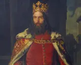 Portret króla Kazimierza Wielkiego, który zasłużył na ten przydomek dzięki swoim dokonaniom. Król w koronie i purpurowym płaszczu.