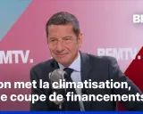 Un homme en costume parle dans un micro, avec le texte "Si on met la climatisation, on se coupe de financements" affiché. Une réflexion sur les enjeux financiers actuels.