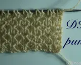 Muestra de tejido con puntos bonitos para tejer bufandas. Un patrón texturizado en color crema sobre fondo claro.