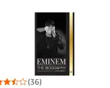 Okładka książki "Eminem: The Biography" z czarno-białym zdjęciem rapera.