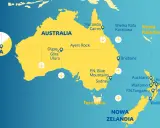 Mapa pokazuje podróż z Dubaju do Australii i Nowej Zelandii, z zaznaczonymi atrakcjami jak Uluru, Wielka Rafa Koralowa i Hobbiton.