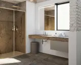Bagno moderno con nicchia doccia in muratura effetto pietra, lavabo in legno grezzo e dettagli rustici.