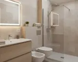 Bagno elegante piccolo con lavabo in legno, specchio luminoso, doccia walk-in e bidet.