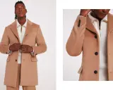 A man models a stylish camel coat, perfect for wearing with a suit. The coat features dark buttons and a classic lapel.