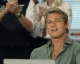 Brad Pitt en la f1 pelicula, con un equipo de boxeo detrás.