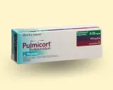 Opakowanie leku Pulmicort, zawierającego budesonid, stosowanego w leczeniu astmy. Dostępny w dawkach 0.25 mg/ml i 0.5 mg/2 ml.