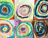 Sechs bunte Kreisbilder, entstanden beim Basteln zum Thema Farben. Jedes Bild zeigt konzentrische Ringe in verschiedenen Aquarellfarben.