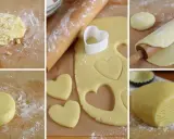 Preparazione di biscotti pasta frolla a forma di cuore. L'impasto viene steso e tagliato con un coppapasta.