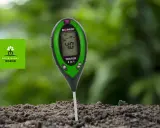 Tester pH gleby w ziemi, wskazujący niski poziom 4.0. Pomoc w odkwaszaniu gleby dla lepszego wzrostu roślin.