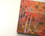 Book cover featuring "Open Impressionism Volume II" by Erin Hanson, showcasing a vibrant, colorful forest scene with bold brushstrokes.