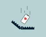 Telefon z sercem spada w pułapkę. Ilustracja symbolizuje rzeczy, o których kłamiemy na portalach randkowych, by zwabić ofiarę.