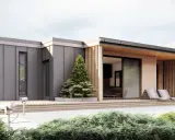 Nowoczesny, tani dom z płaskim dachem, z drewnianą werandą i dwoma leżakami.