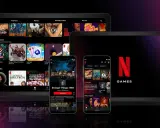 Gry na Netflixie na tabletach i telefonach. Zobaczysz tu ikony gier, w tym Stranger Things, oraz interfejs aplikacji.