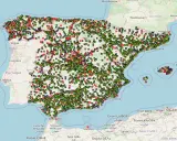 Mapa de España y Portugal con miles de puntos de recarga para coches eléctricos.