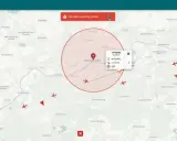 Droniq Karte zeigt eine Warnung vor Eindringlingen über Frankfurt. Flugzeuge sind auf der Karte markiert.