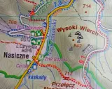 Mapa turystyczna Bieszczadów z zaznaczonymi szlakami, punktami widokowymi i jaskiniami. Widoczne nazwy: Nasiczne, Wysoki Wierch, Pod Jaskiniami.