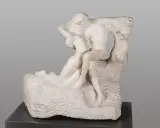 A marble sculpture of two embracing figures, a man lifting a woman, evoking Rodin's eternal spring of love and passion.