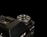 Pokrętło czułości ISO na aparacie Fujifilm X-T3. Dowiedz się, co to jest iso fotografia i jak wpływa na Twoje zdjęcia.