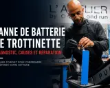 Un technicien répare une batterie de trottinette électrique, abordant le problème de panne. Diagnostic, causes et réparation.