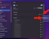 Ekran komputera z menu Wi-Fi, gdzie czerwona strzałka wskazuje opcję "Kopiuj hasło".