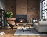 Przytulny salon w stylu loft. Ceglana ściana, kominek, skórzany fotel i wygodna kanapa – idealne salon loft inspiracje.