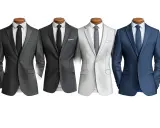 Four mannequins display suits: two dark grey, one light grey, and one blue. Lapels, buttons, and pockets define what makes a suit a suit.